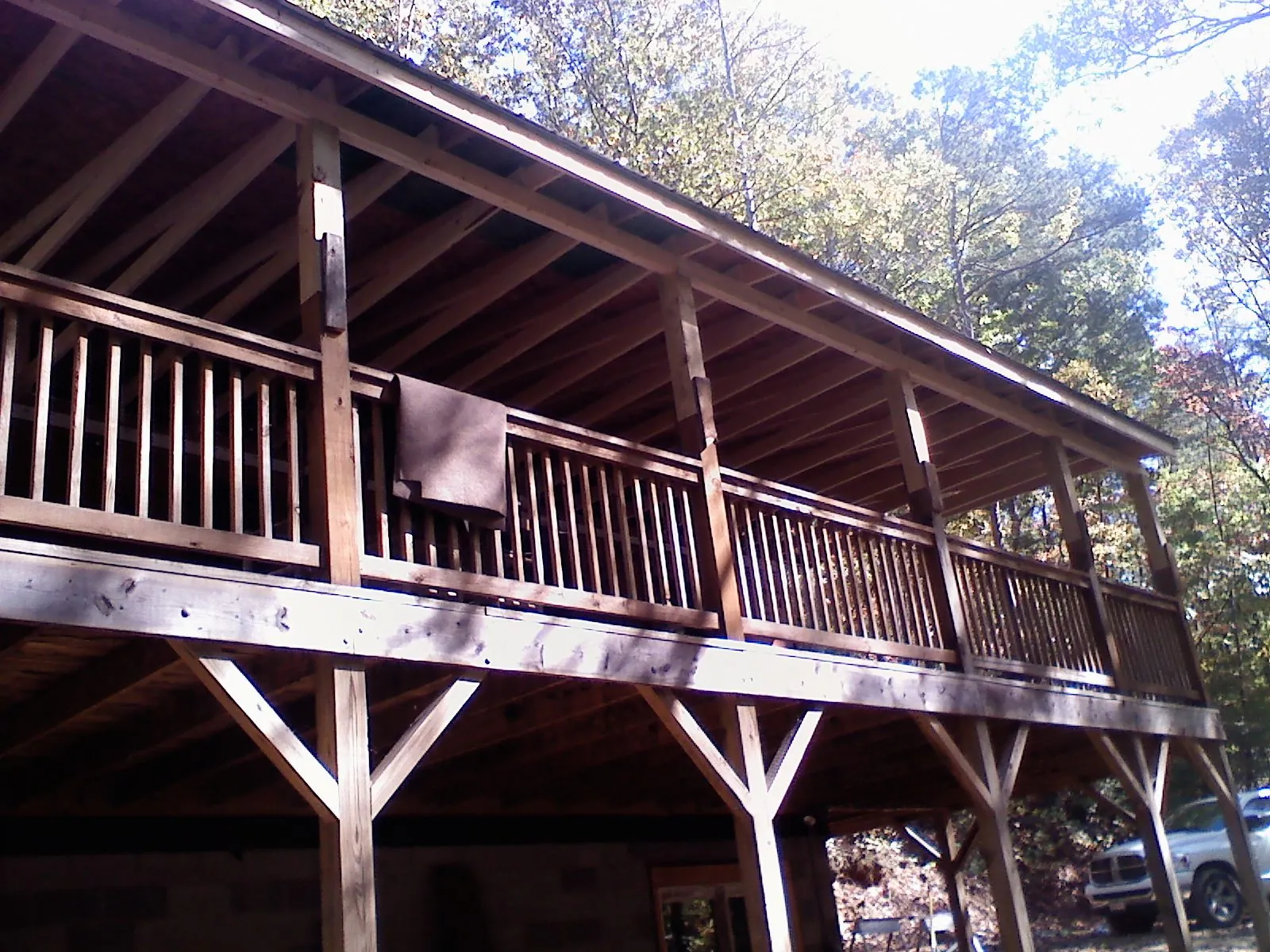 Timber framing under a new elevated porch and deck — Roof Leak Repair in Hitchcock by Roofing Brothers
